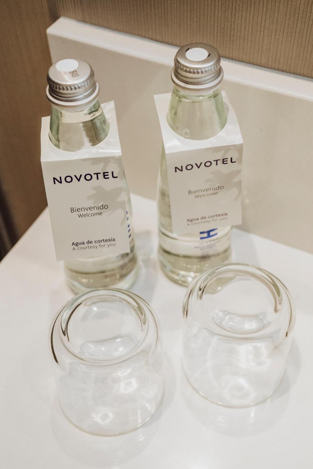 Novotel Medellin El Tesoro Eksteriør billede Bottled water in a hotel room